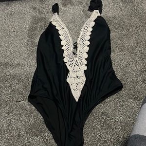 Bathing suite from Target worth 40$. Worn once was too low cut for me.